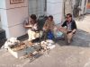 Shoe_repair_on_the_pavement.jpg